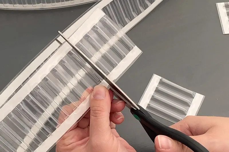 cutting drawer divider holders with scissors