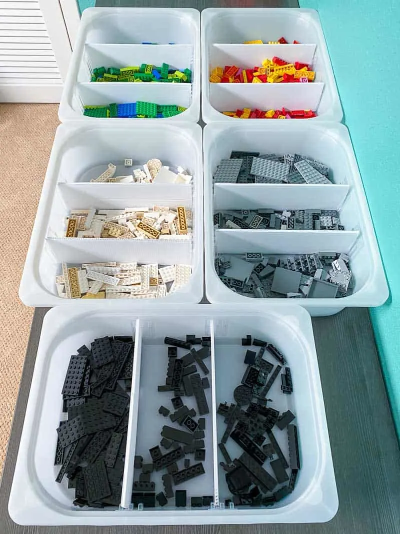 Lego pieces sorted by color and size with DIY drawer dividers in each bin