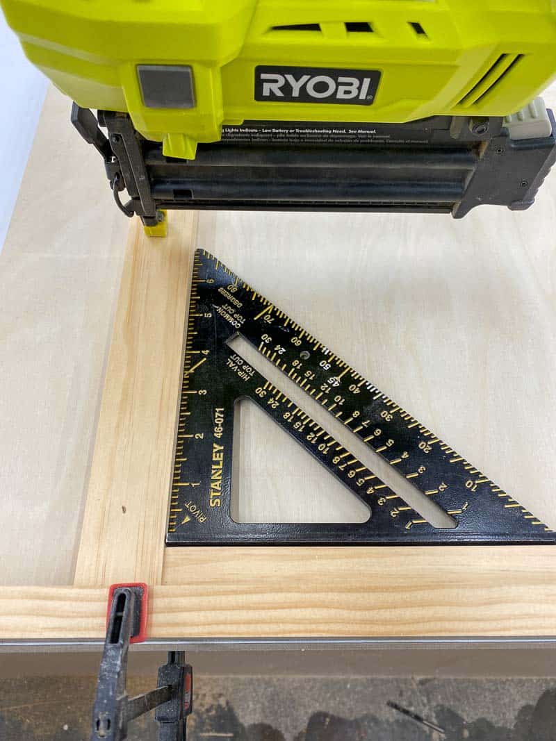 attaching drawer stop to Lego desk with Ryobi brad nailer