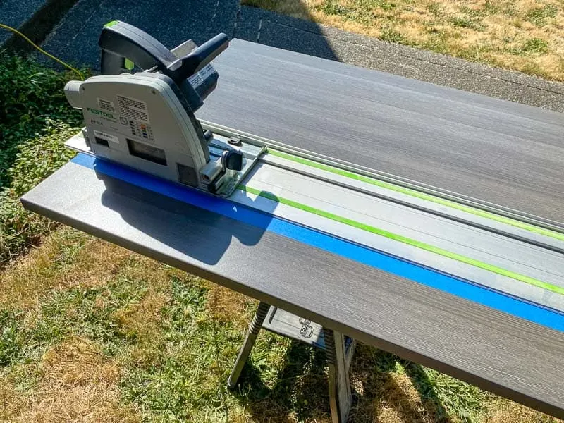trimming the width of the Lego desk top with a track saw outside