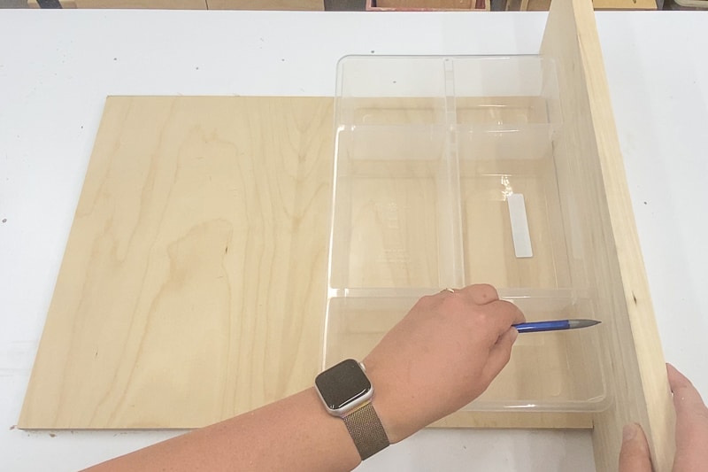 marking height of sides using the plastic organizer as reference