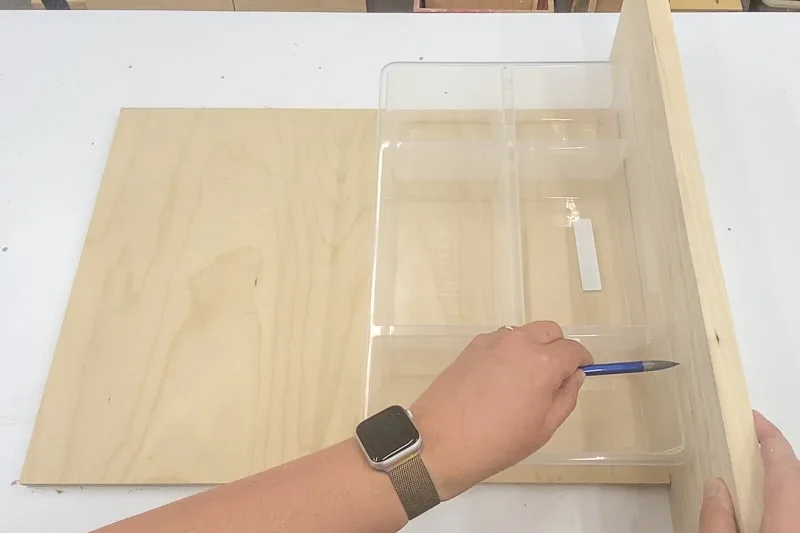 marking height of sides using the plastic organizer as reference