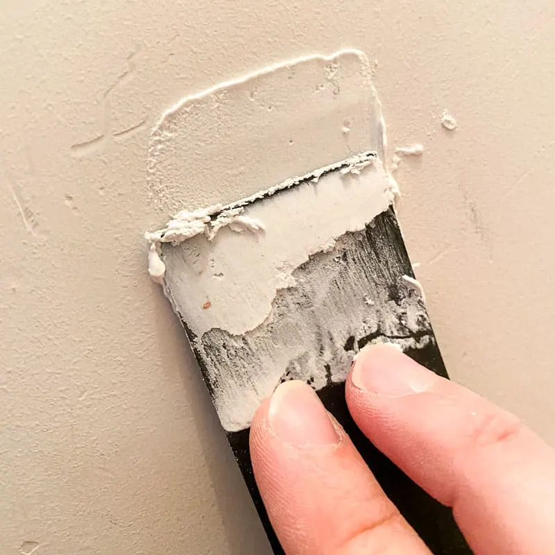 spackling over dents in drywall