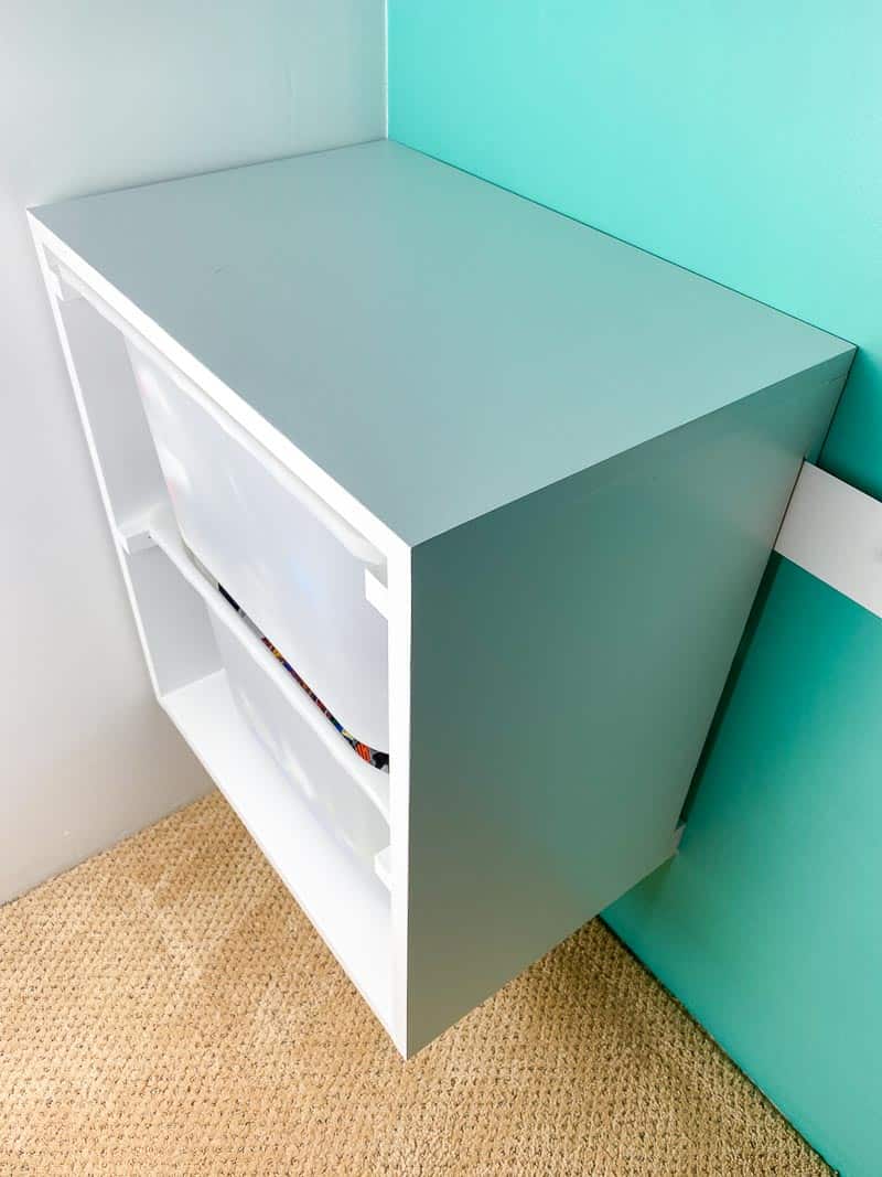 wall mount storage bins on French cleat in closet