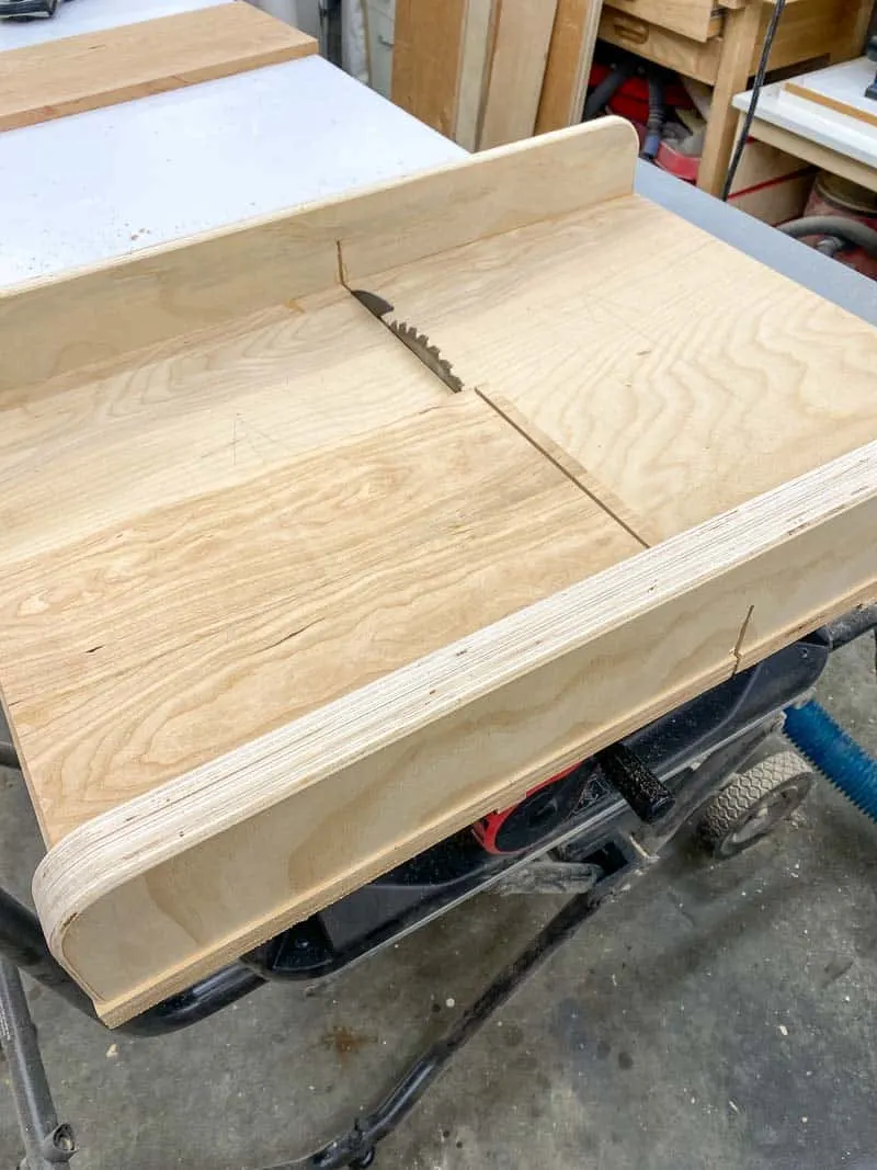 cutting panel to length at the table saw on a crosscut sled
