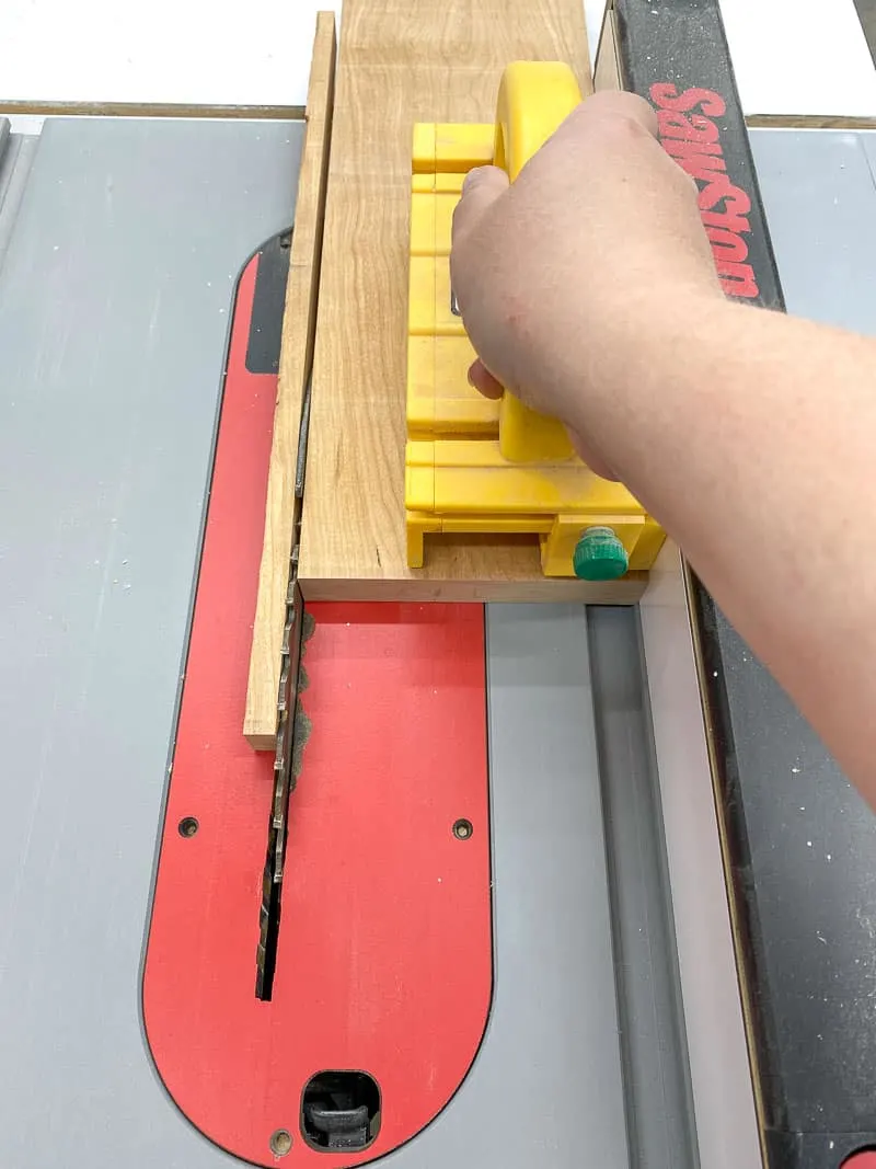 cutting off rough edge of board at the table saw