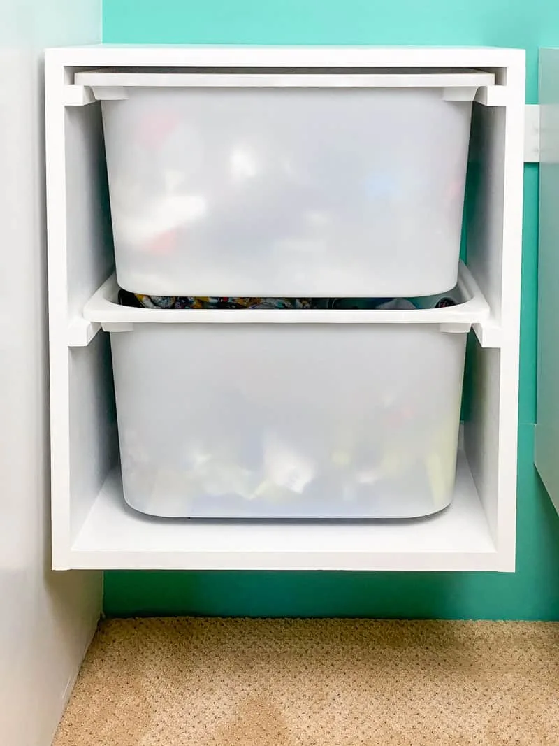 DIY wall mount storage bins hanging from French cleat in closet