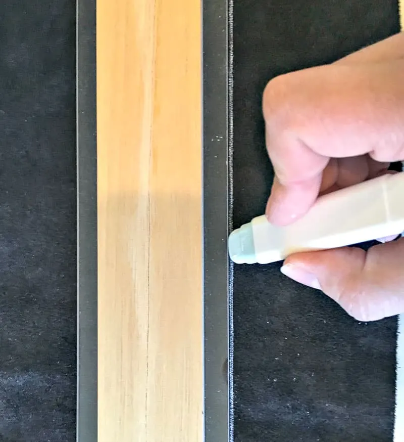 marking leather with a chalk wheel for cutting the leather 