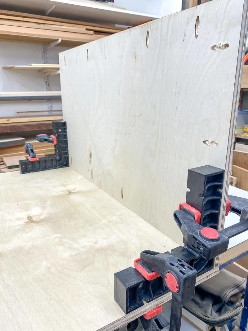 assembly squares holding table saw stand pieces upright