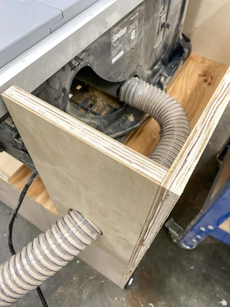 table saw stand with dust collection hose