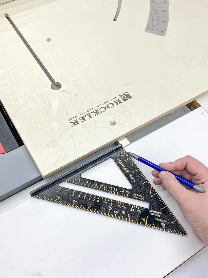 marking placement of grooves for outfeed section of table saw stand