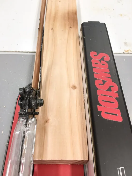 cutting 2x4 on a table saw