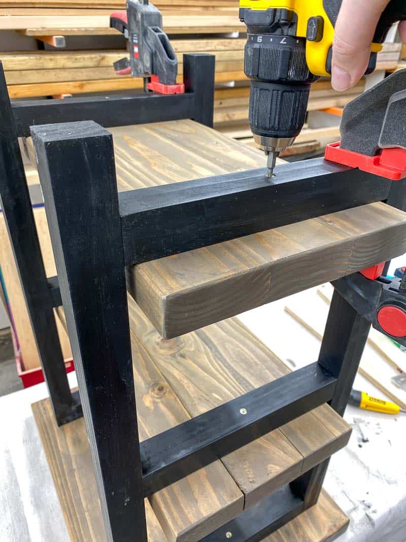 attaching the bottom shelf of the rustic end table