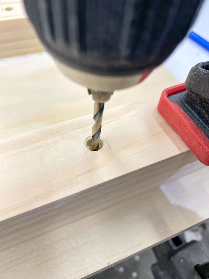 drilling a countersink hole into the end table frame