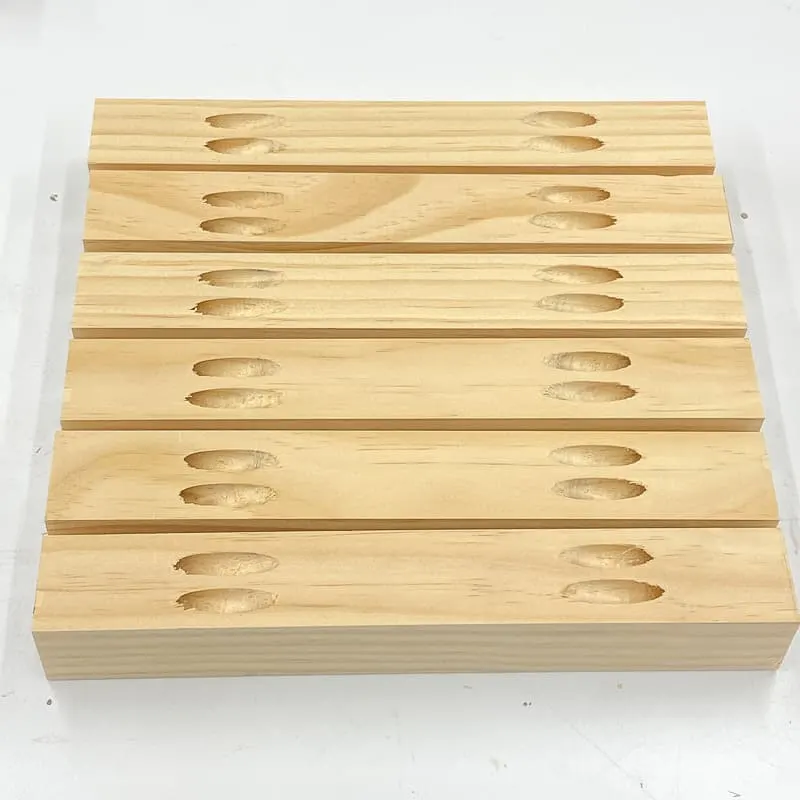 pocket holes in both ends of six boards