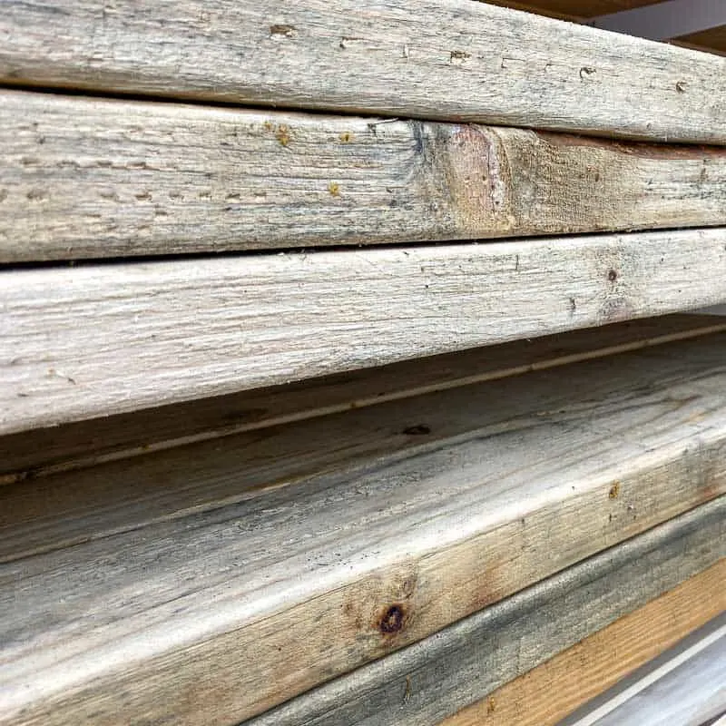 reclaimed 2x4 lumber on lumber rack