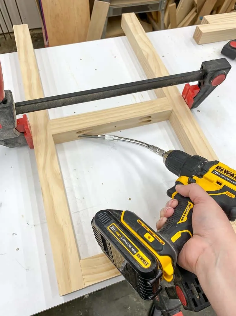 using a flexible right angle drill adapter to attach the rungs of the end table legs together with pocket hole screws