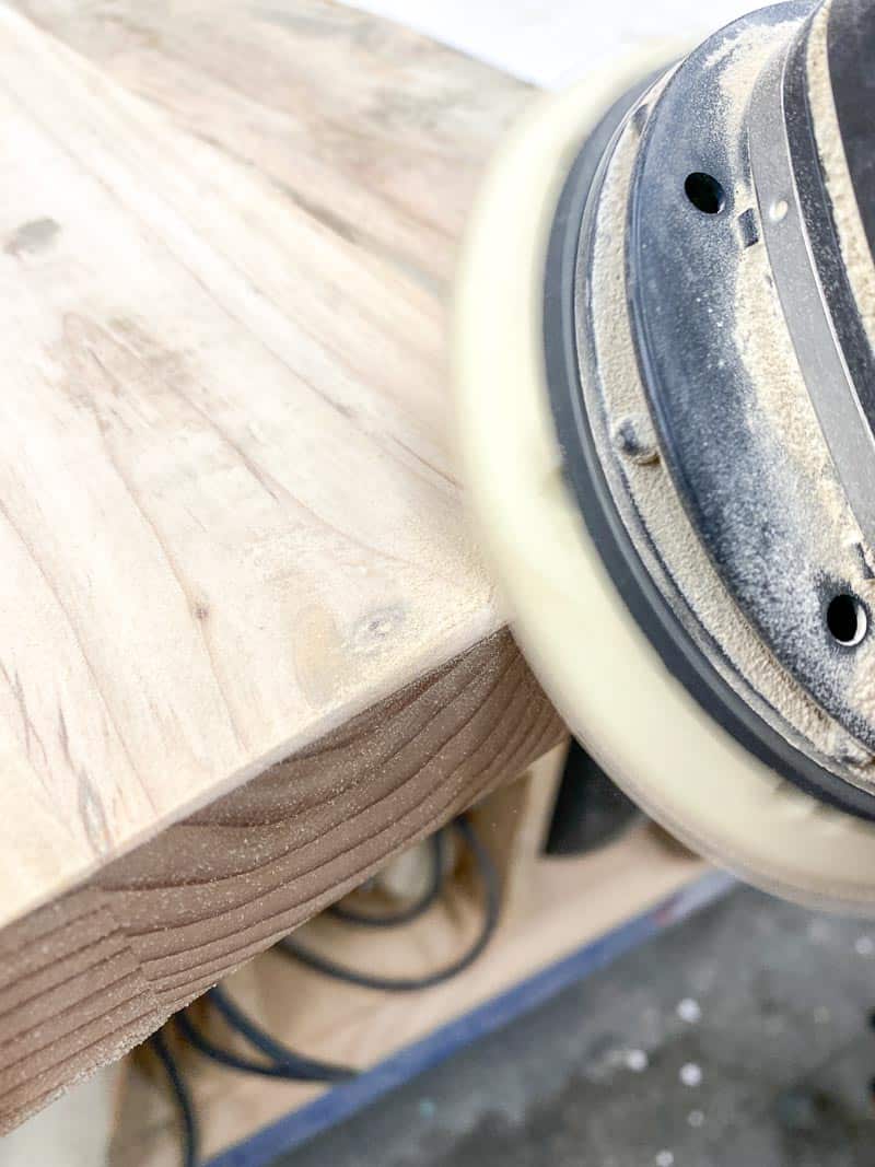 rounding over the freshly cut edges with a sander