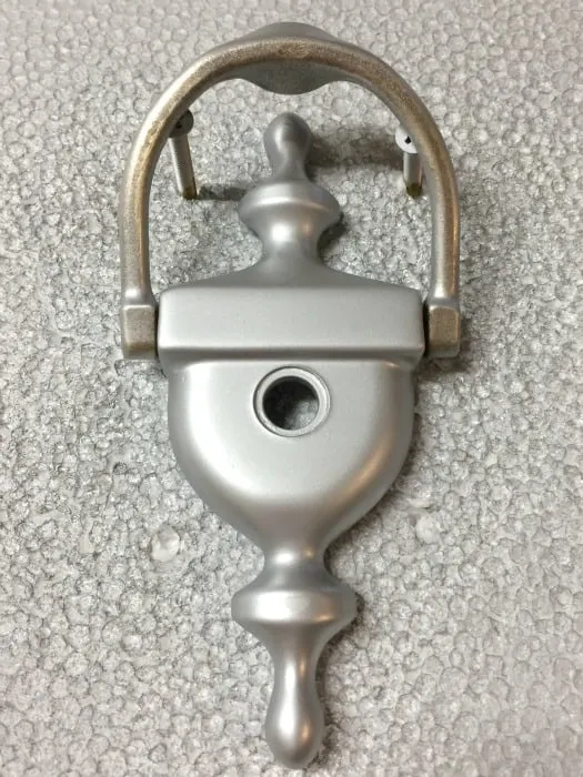 spray painted door knocker on styrofoam