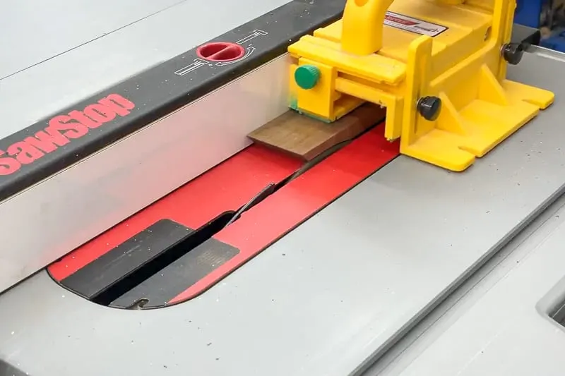 cutting rabbet along bottom inside edge of dice tray sides at the table saw