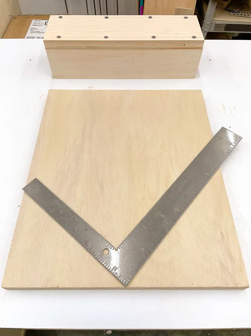 framing square on top of spline jig