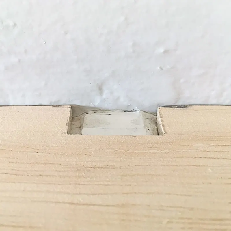 ¼" plywood with notch cut out for mantel bracket