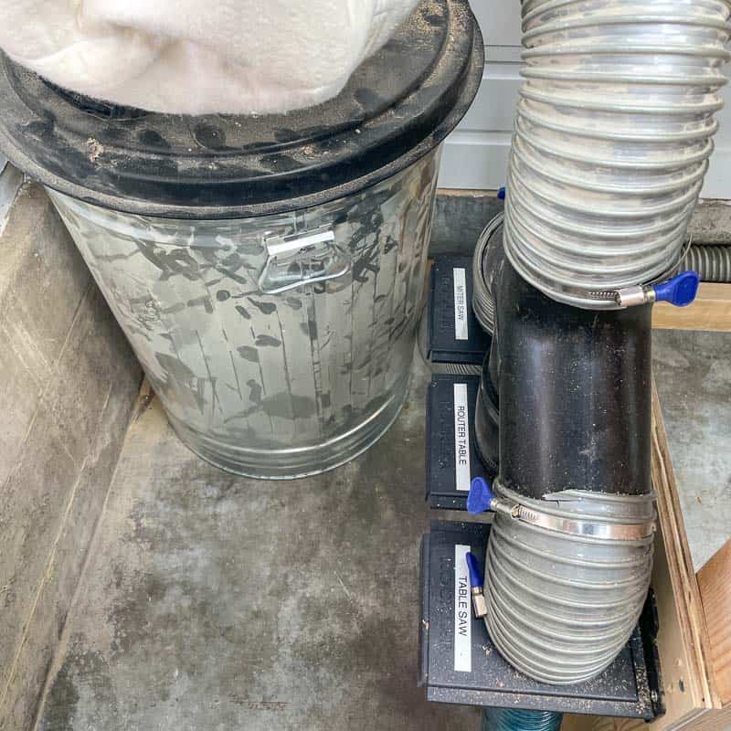 3 way dust collection junction with blast gates to each tool in the workshop