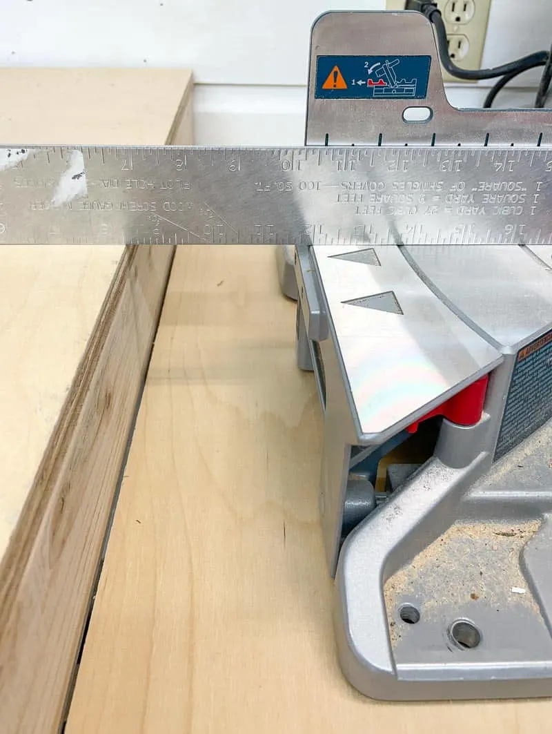 checking for level between miter saw and sides