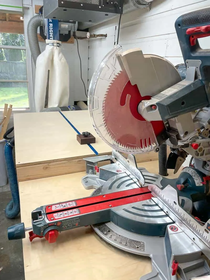 miter saw station with stop block and dust collector