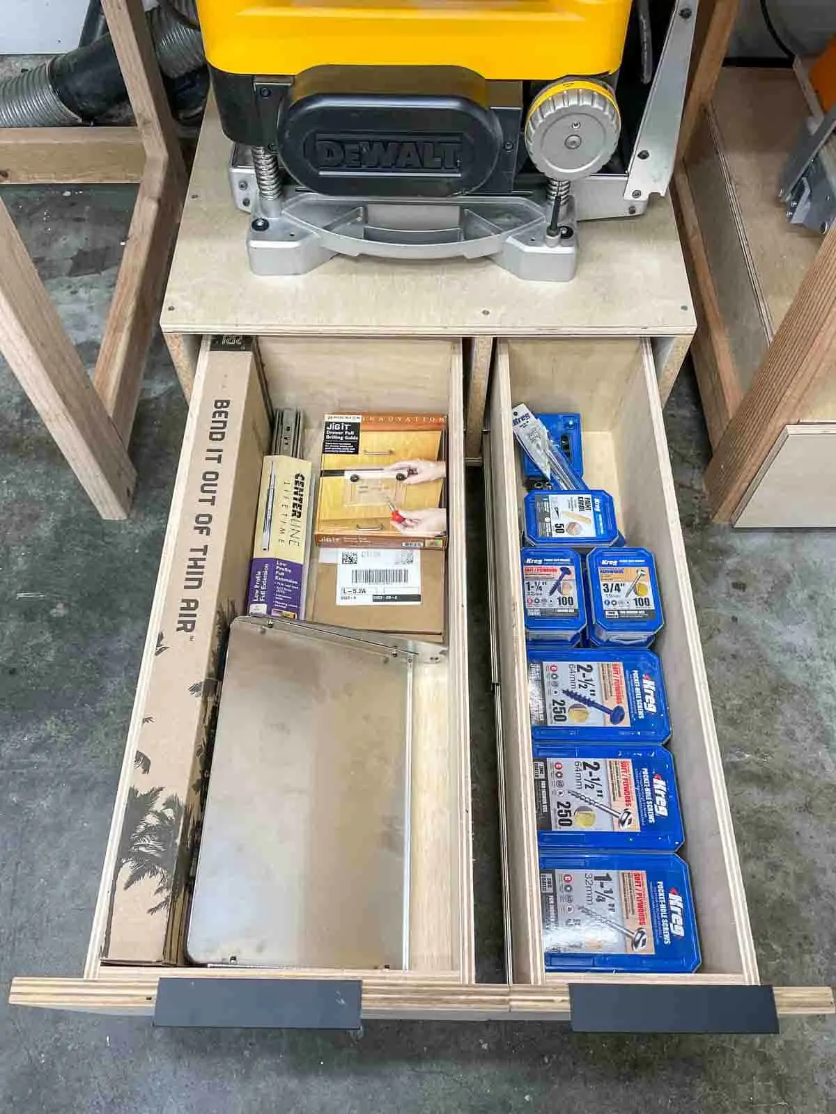 planer stand with drawers pulled out to display screws and other accessories