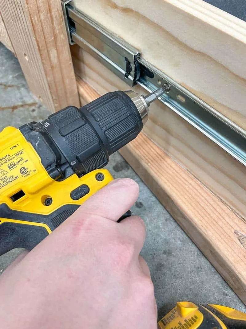 attaching drawer slide to drawer with a drill