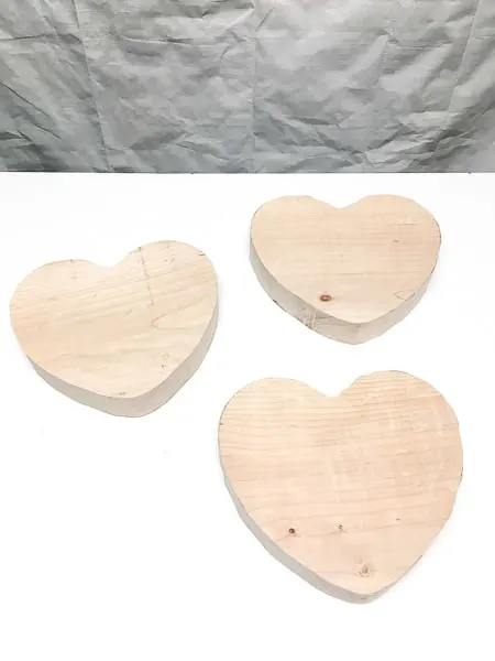 large wooden hearts on workbench