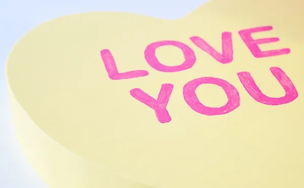 close up of lettering on conversation hearts decor