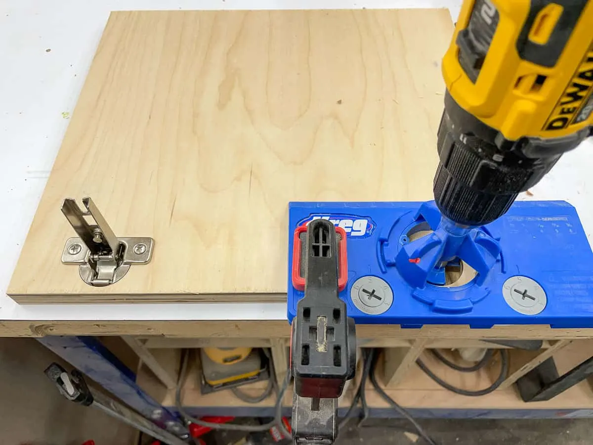 drilling concealed hinge holes in router table cabinet doors with a jig