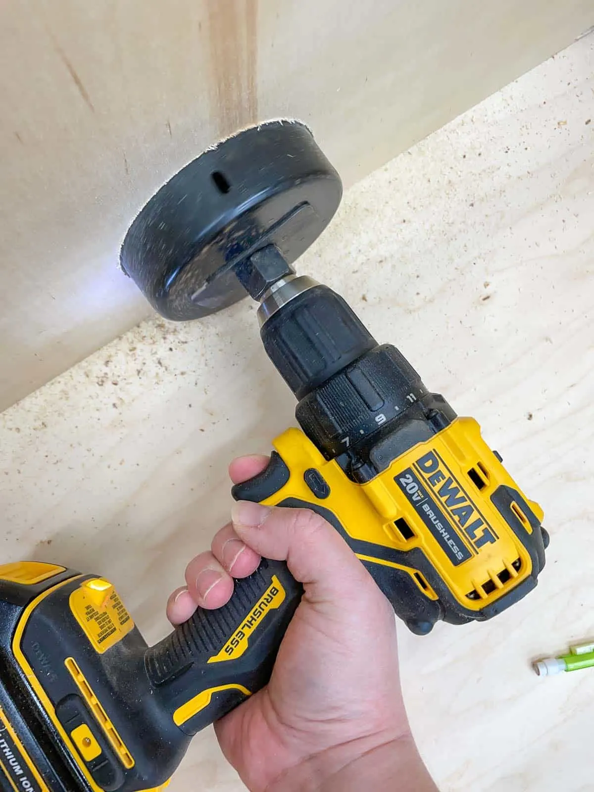 drilling holes for router table dust collection with a hole saw