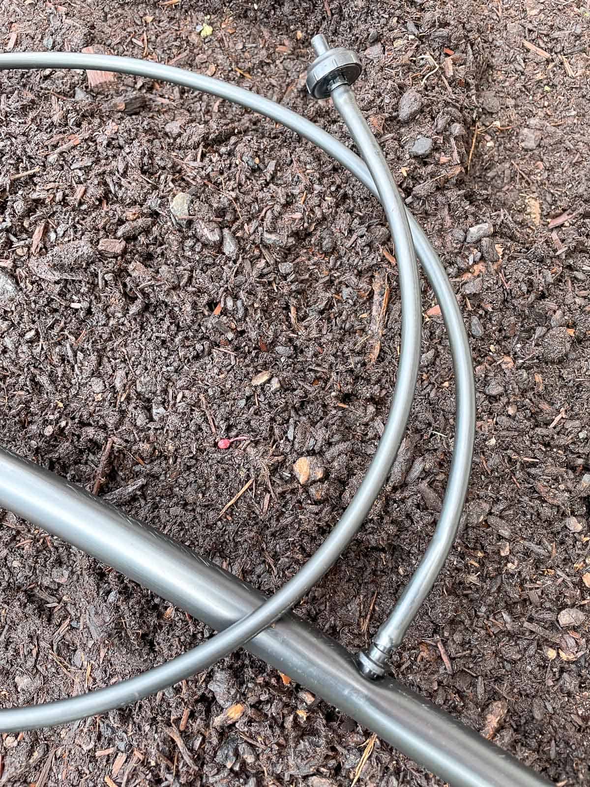 ¼" drip tubing with barbed connector and 1 gallon emitter