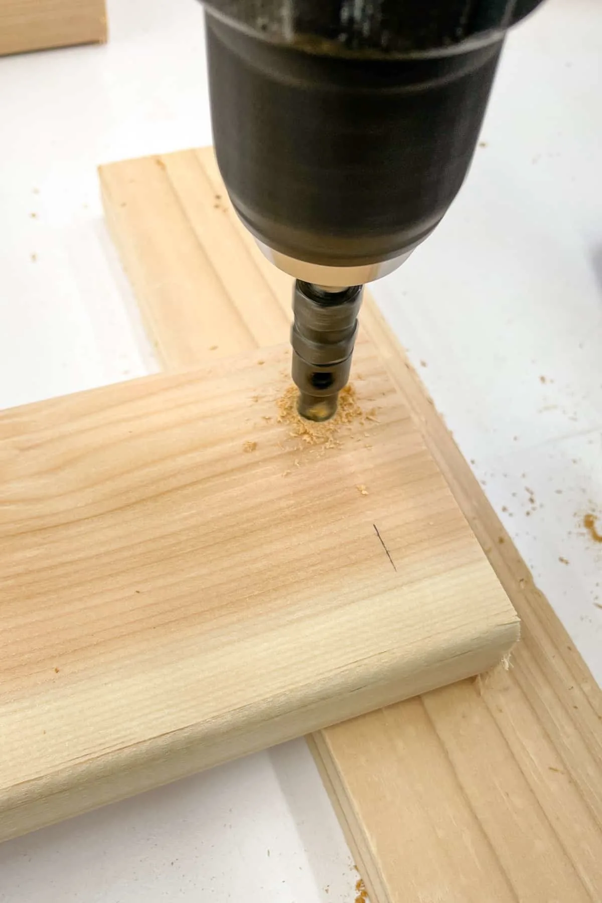 drilling a countersink hole in the ends of the plant shelf slats
