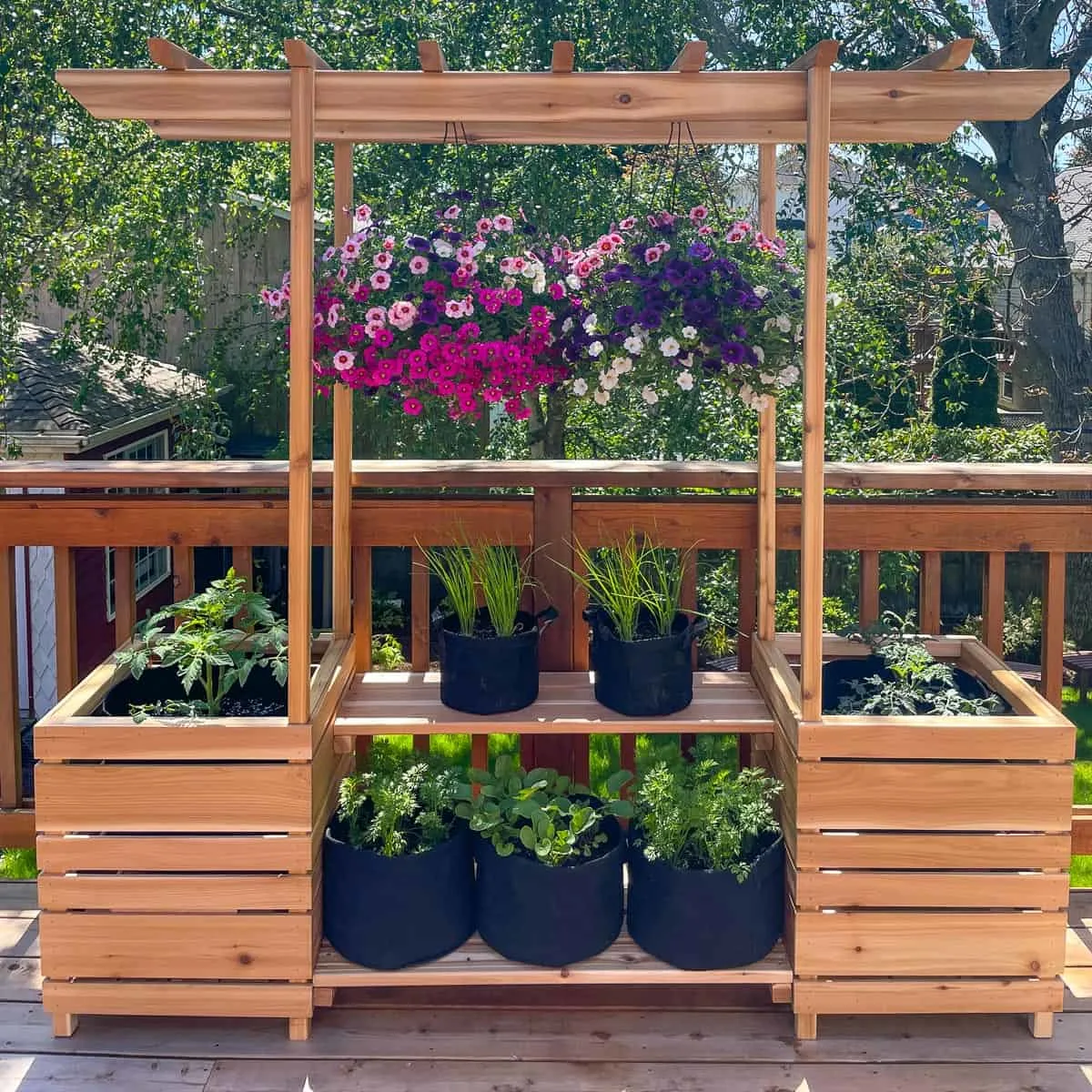 DIY outdoor plant stand with arbor, planter boxes and hanging baskets