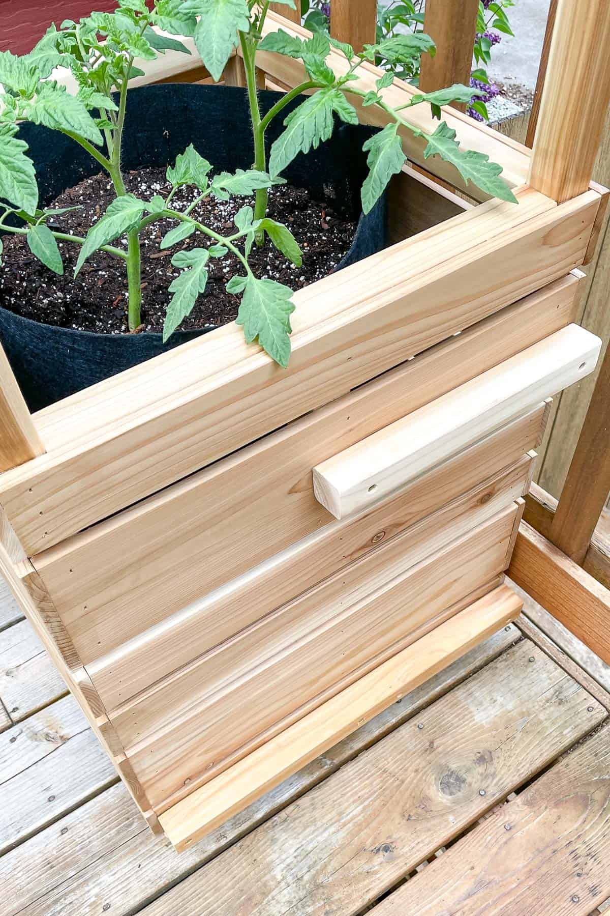 side of plant stand with shelf brackets attached