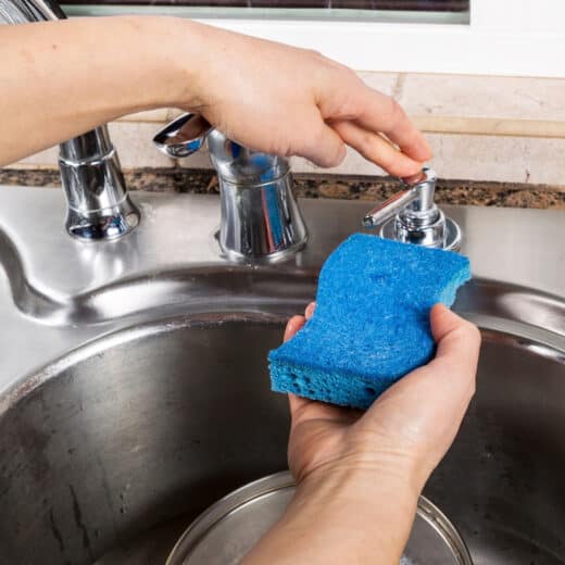 Sink mounted soap dispenser