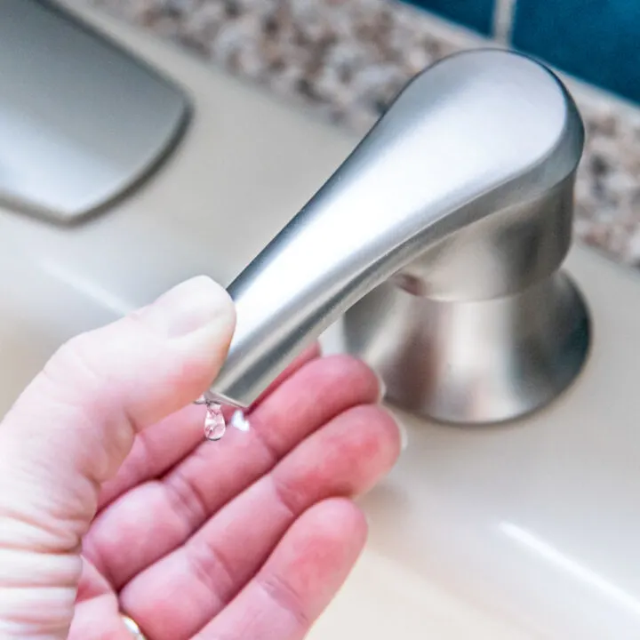 kitchen sink soap dispenser in use