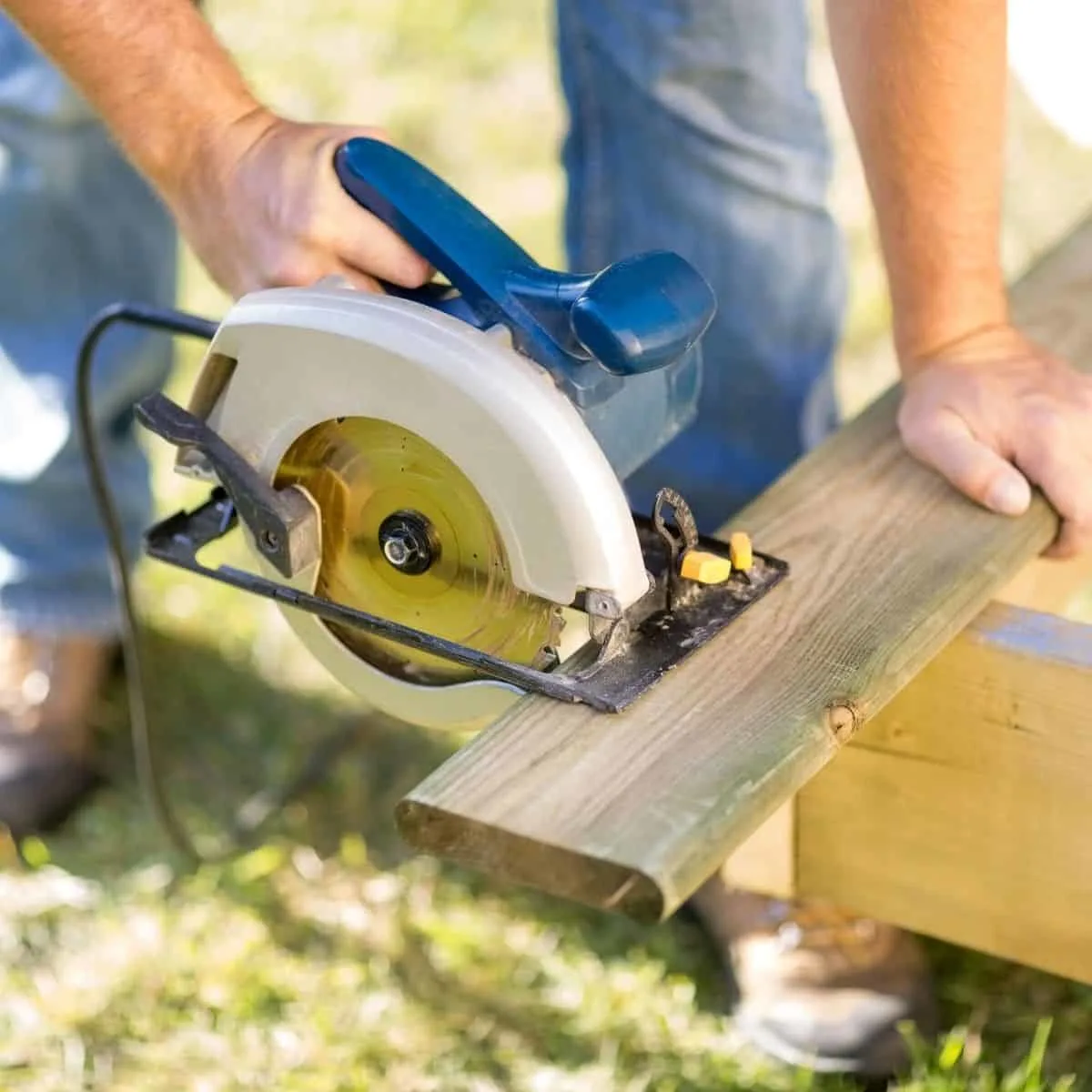 cutting a deck board with a circular saw