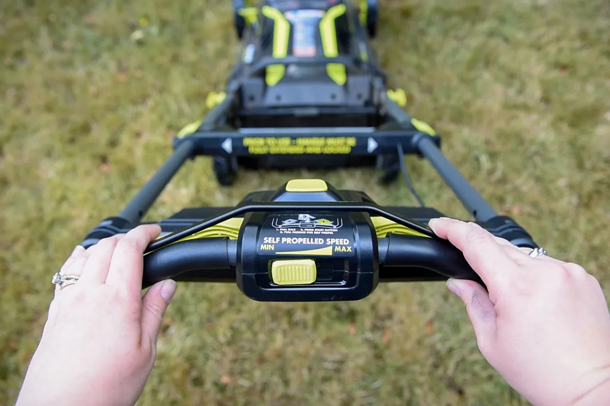 lower the bar before starting the Ryobi electric lawn mower