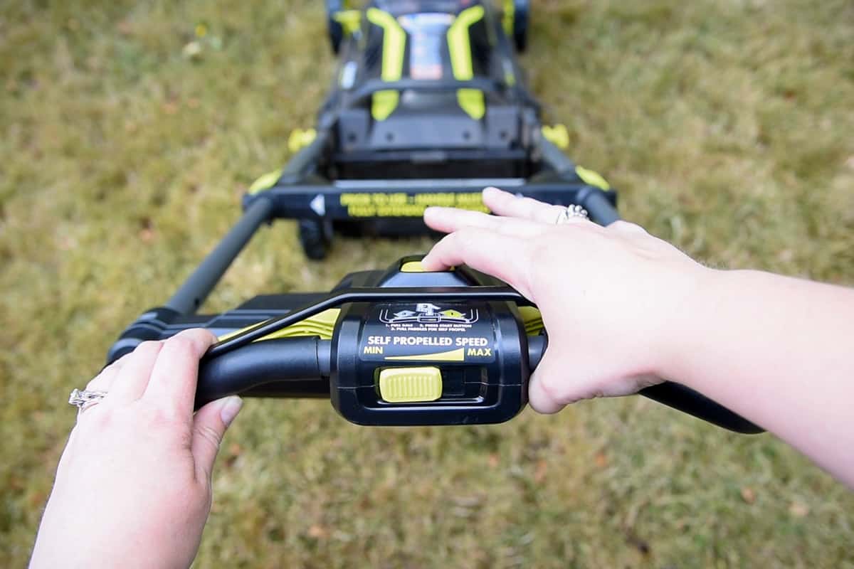 starting the Ryobi electric lawn mower