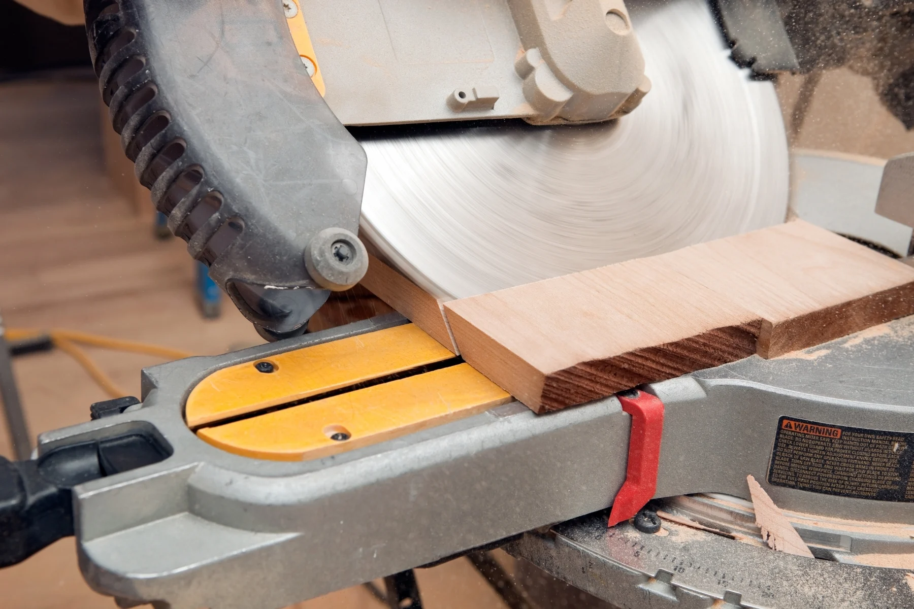 single bevel miter saw making a cut at an angle