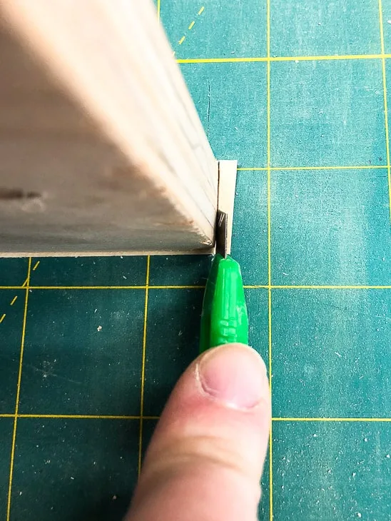 trimming end of edge banding with a utility knife