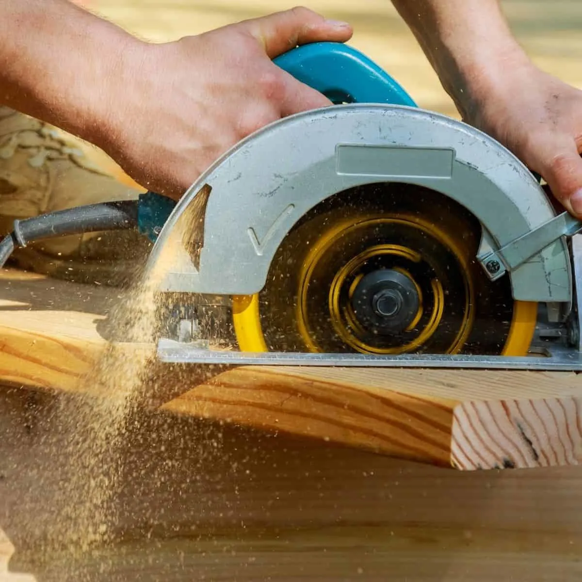 circular saw cutting a board