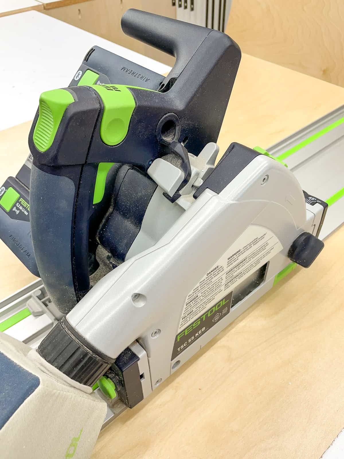 battery powered Festool track saw on track