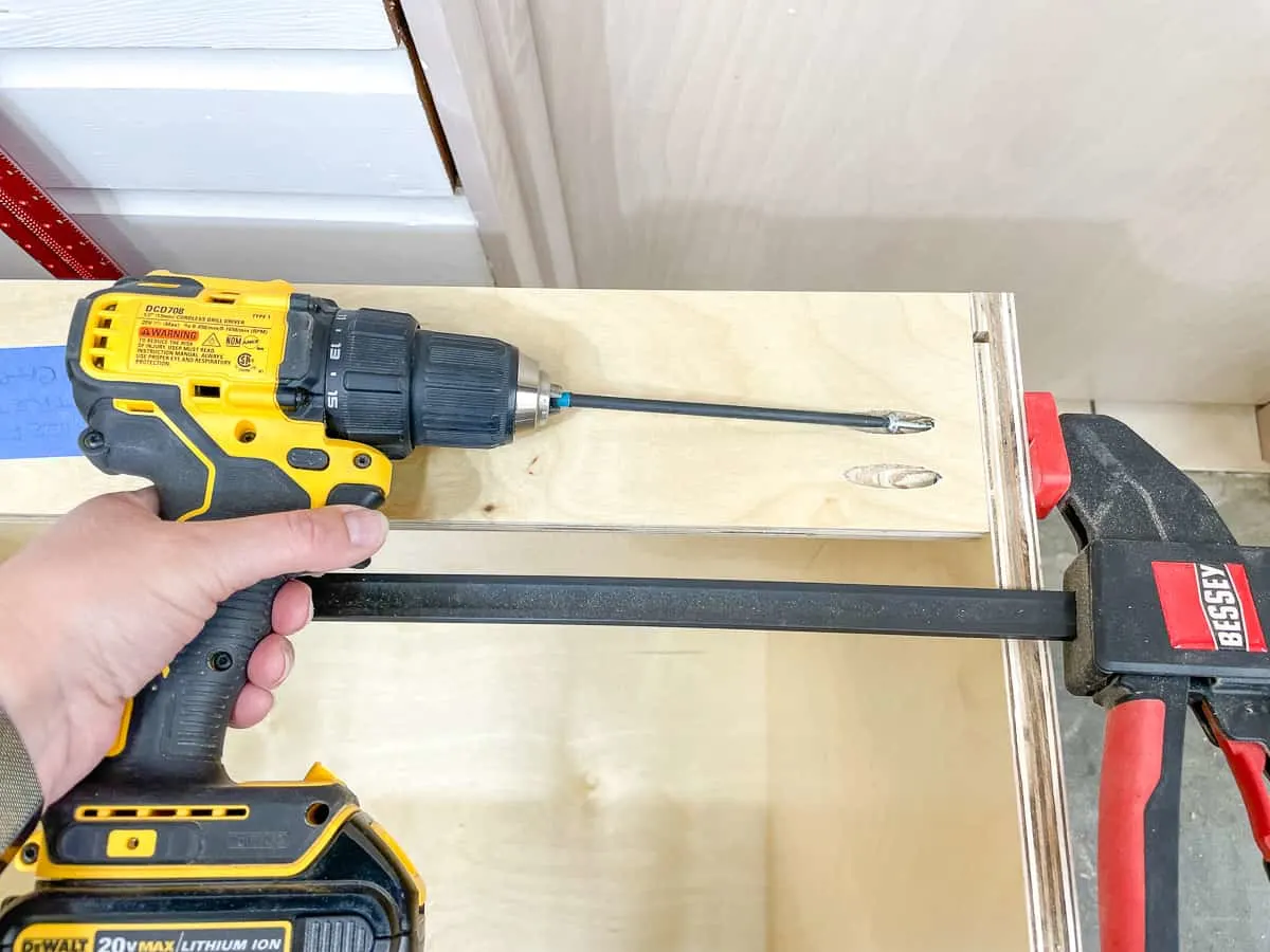 attaching the back stretcher to the cabinet box with pocket hole screws