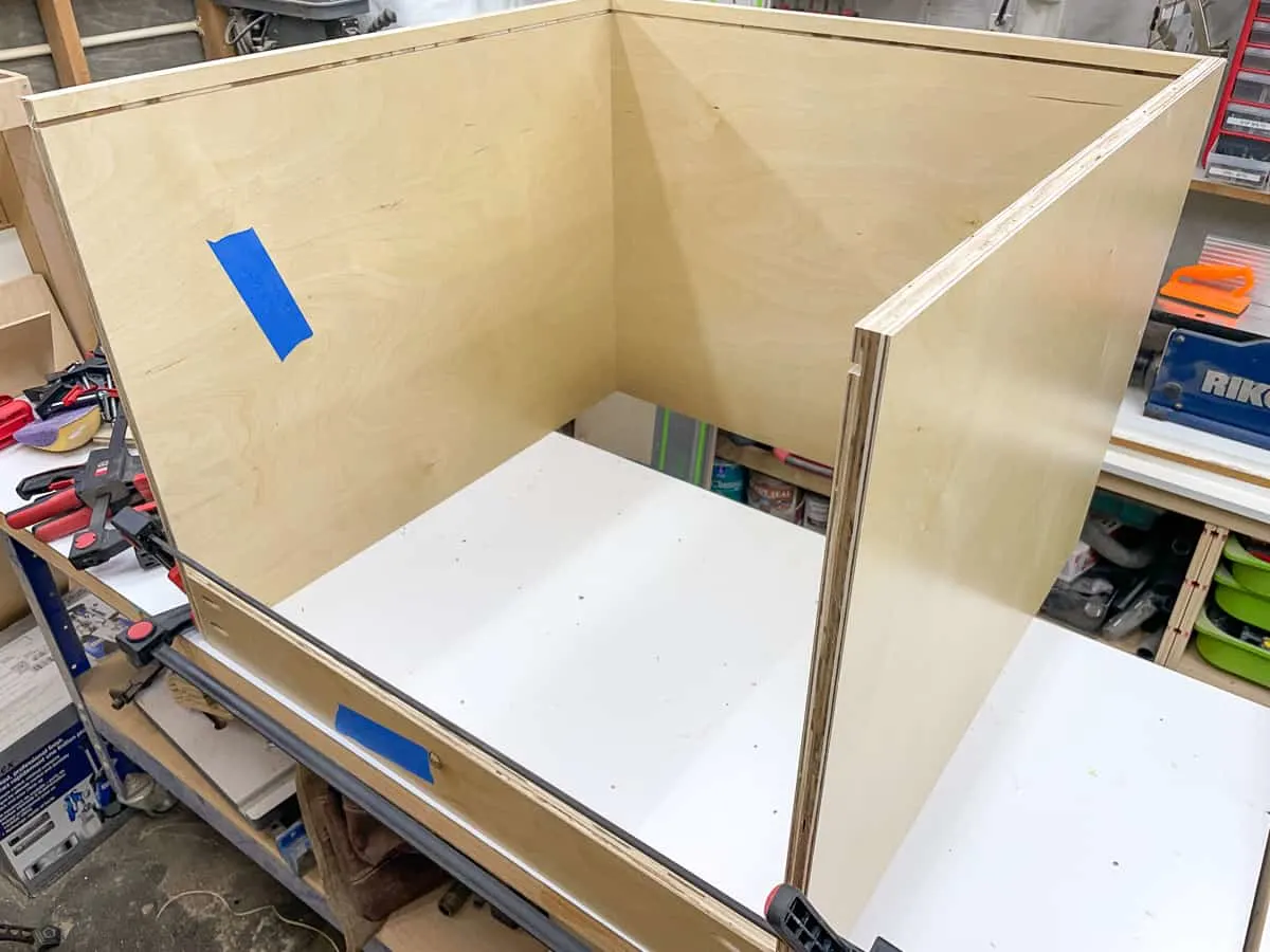 attaching the front stretcher to the cabinet box